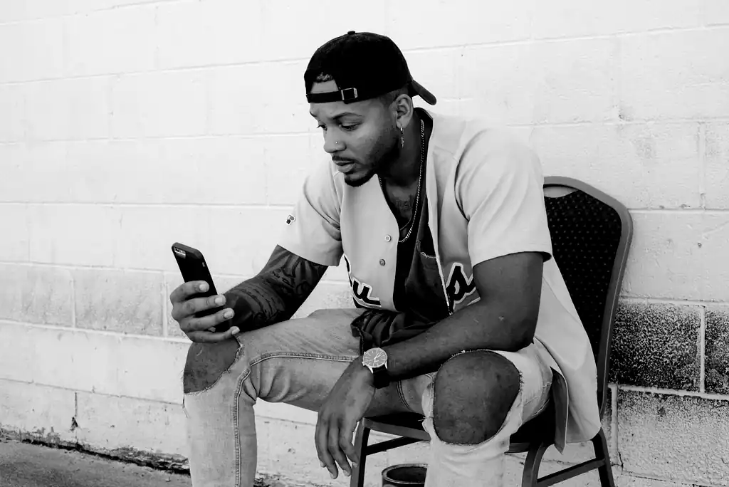 A man looking at his phone